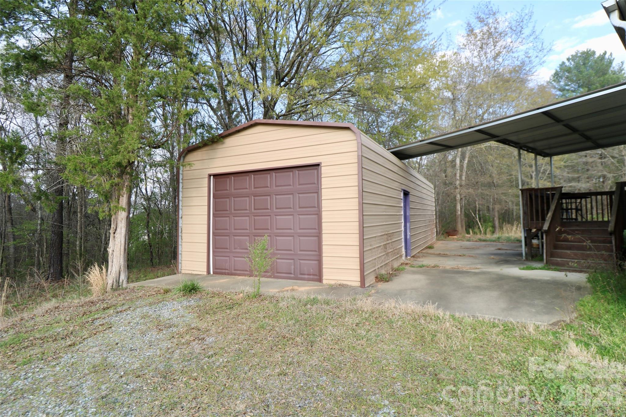 116 Sienna Court Grover, NC 28073 - Photo 19 of 19 a view of a house with a small yard and large tree