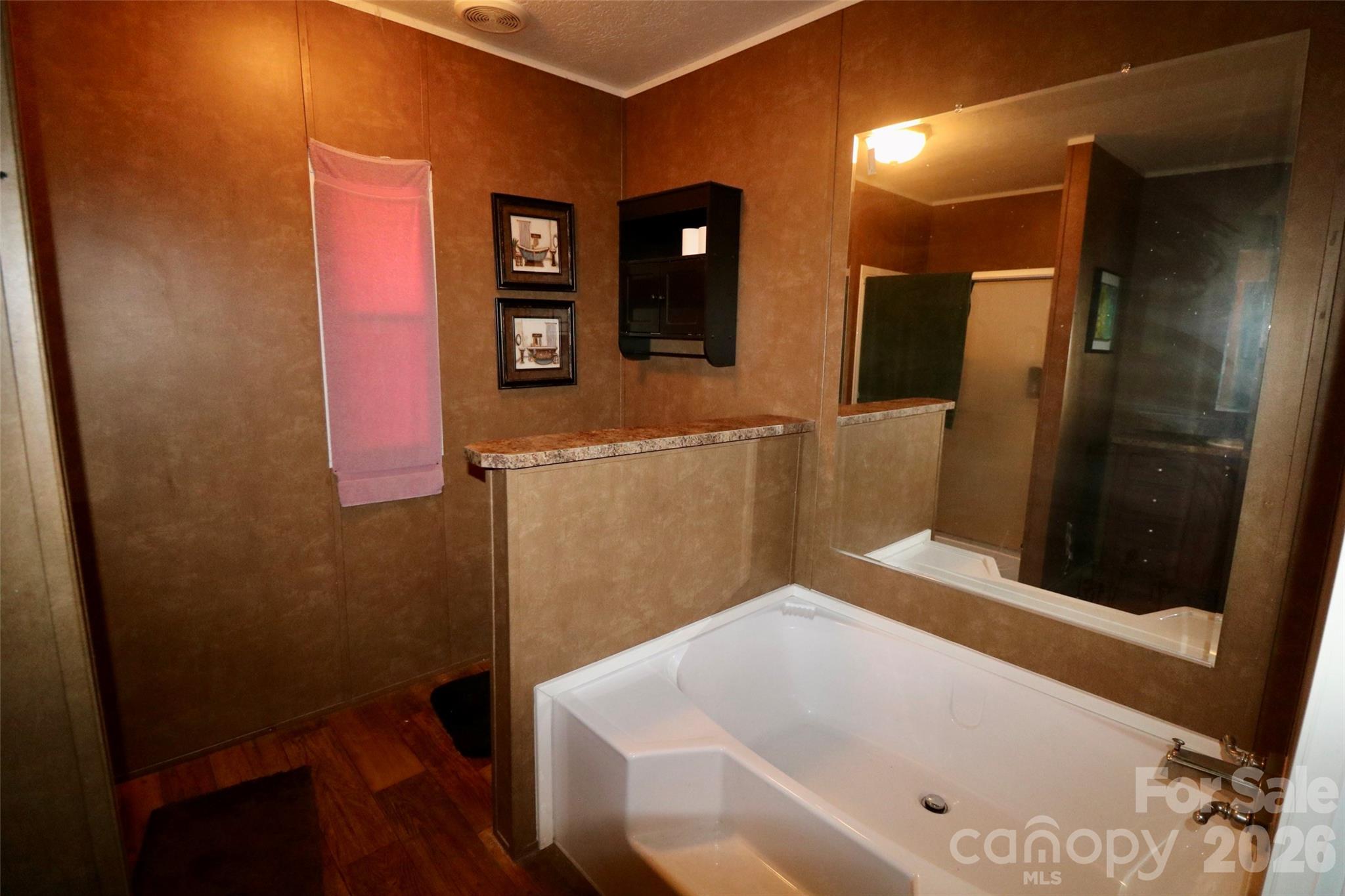 116 Sienna Court Grover, NC 28073 - Photo 10 of 19 a bathroom with a bathtub