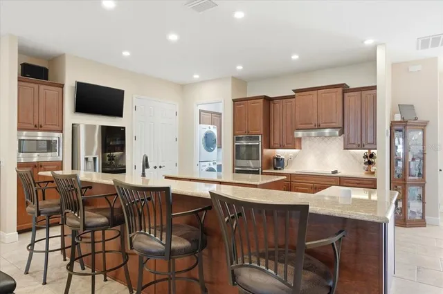 $695,000 | 719 Teaberry Trail, Polk City, FL 33868