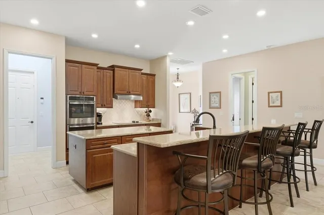 $695,000 | 719 Teaberry Trail, Polk City, FL 33868