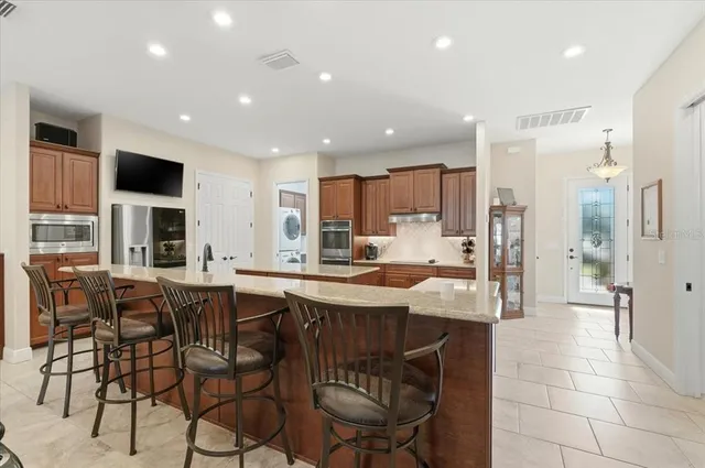 $695,000 | 719 Teaberry Trail, Polk City, FL 33868