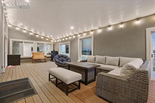 a living room with furniture and a table