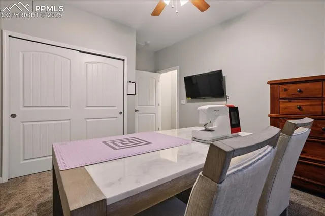 a view of a workspace with furniture