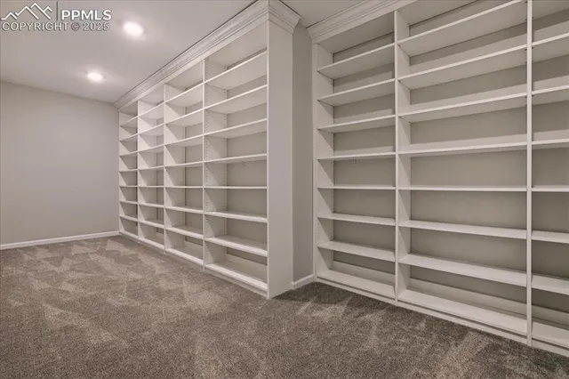 a view of an empty room with a empty shelves