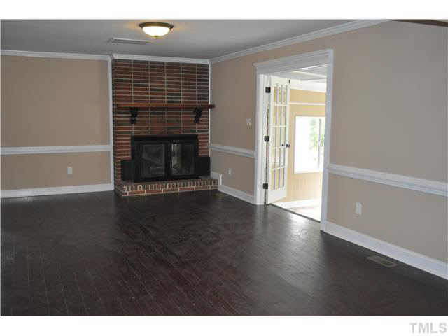 4579 Barber Mill Road Clayton, NC 27520 - Photo 9 of 24 Large living room with fireplace