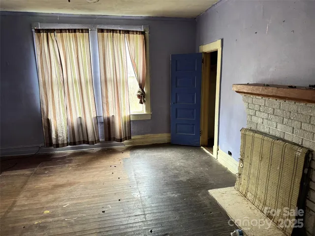 an empty room with windows