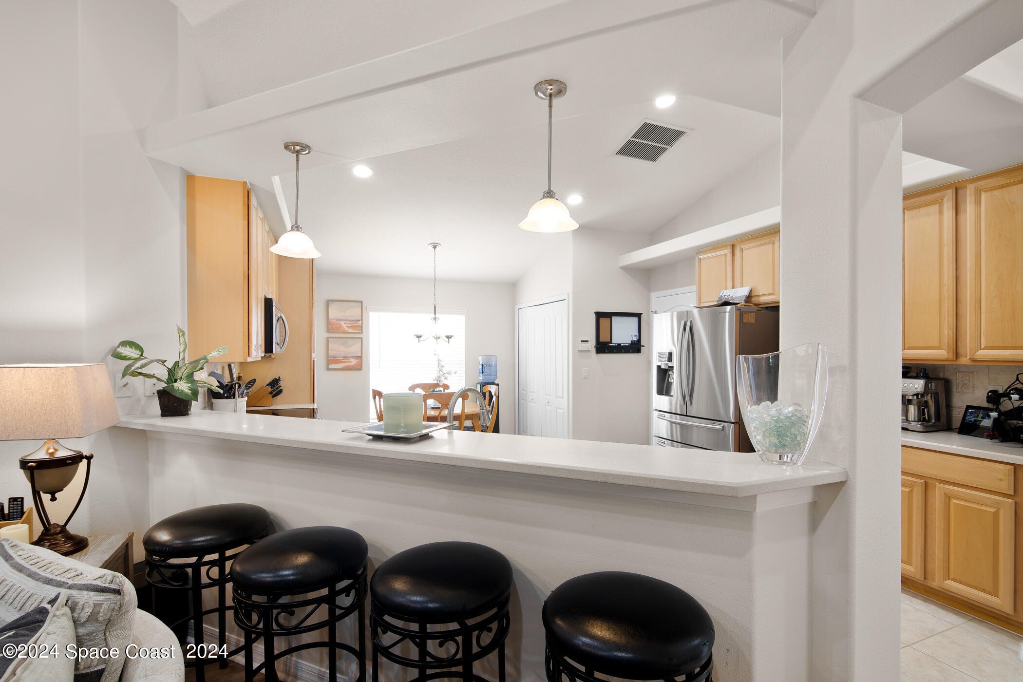 3412 Siderwheel Drive Rockledge, FL 32955 - Photo 13 of 39 a kitchen with stainless steel appliances a sink and a refrigerator