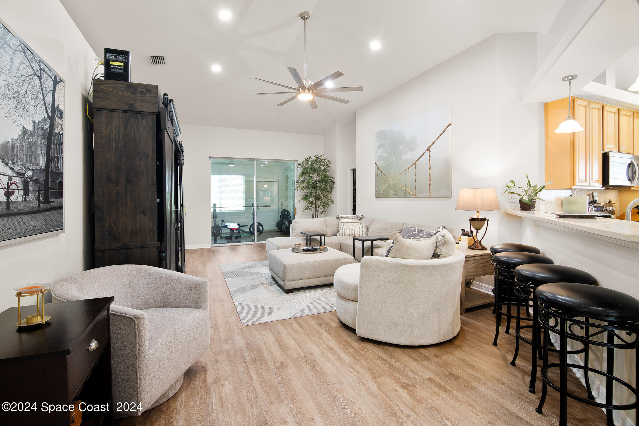 3412 Siderwheel Drive Rockledge, FL 32955 - Photo 17 of 39 a living room with furniture and a large window