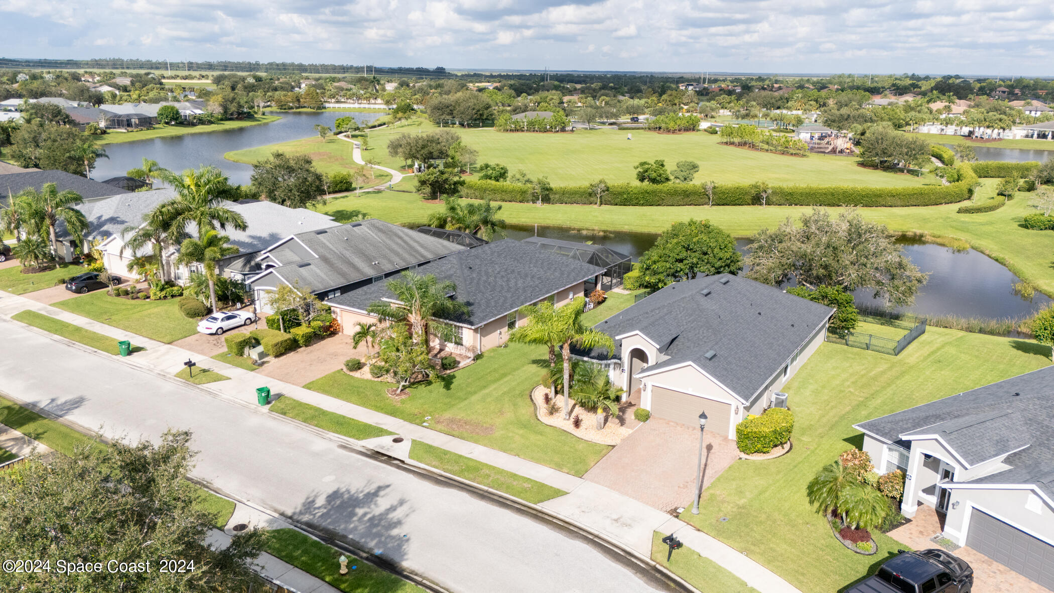 3412 Siderwheel Drive Rockledge, FL 32955 - Photo 2 of 39 an aerial view of ocean and residential houses with outdoor space