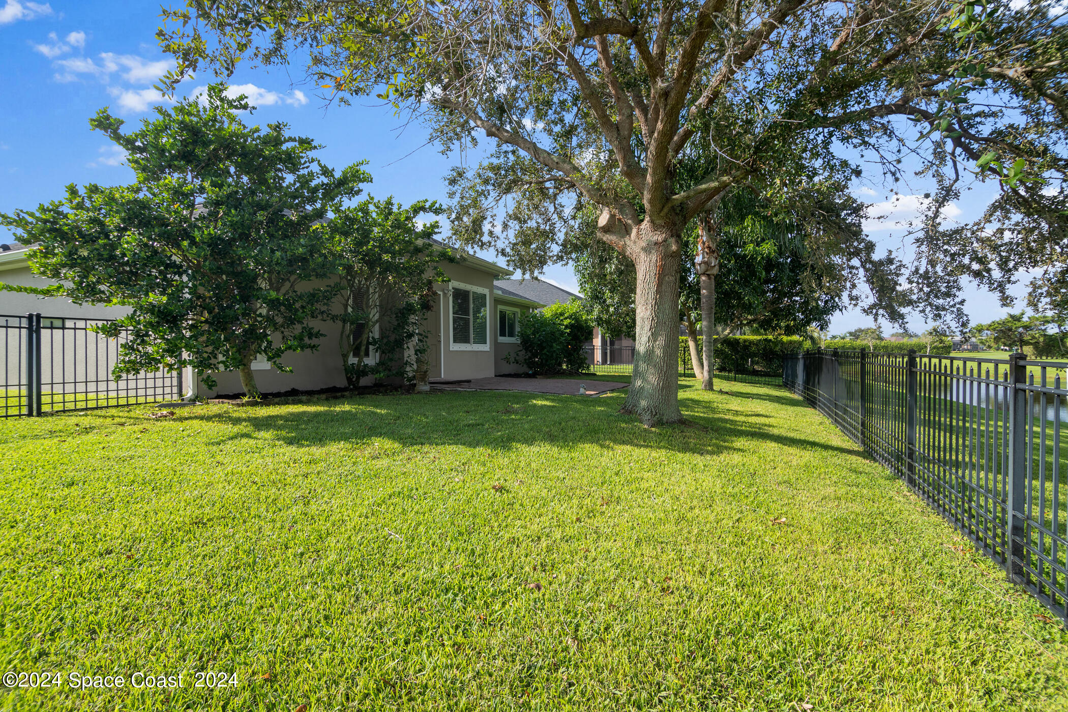 3412 Siderwheel Drive Rockledge, FL 32955 - Photo 29 of 39 a view of a garden with large trees