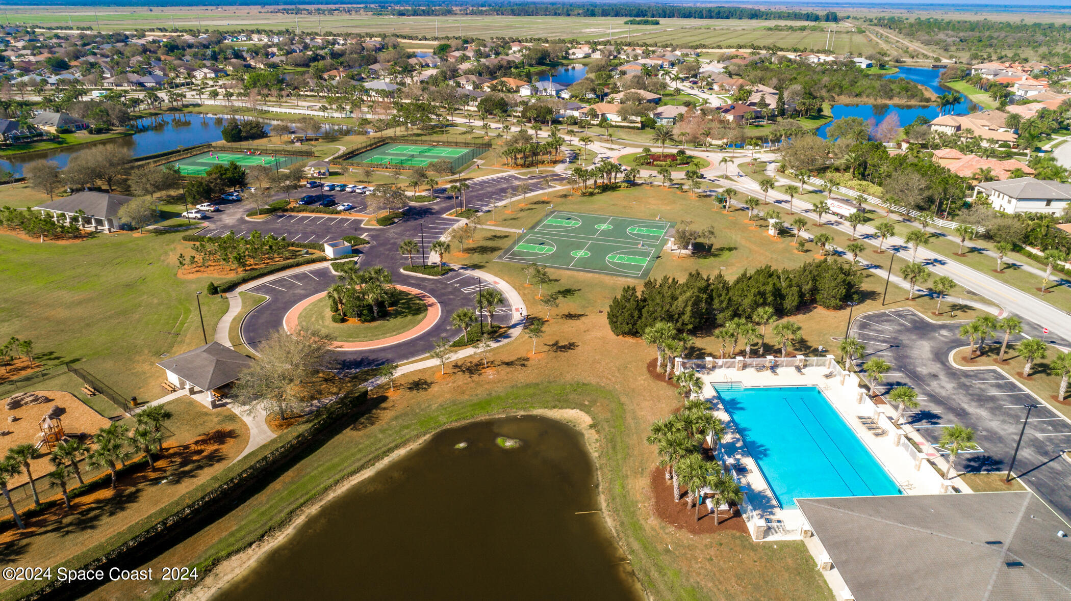 3412 Siderwheel Drive Rockledge, FL 32955 - Photo 35 of 39 an aerial view of a house with a swimming pool yard and outdoor seating
