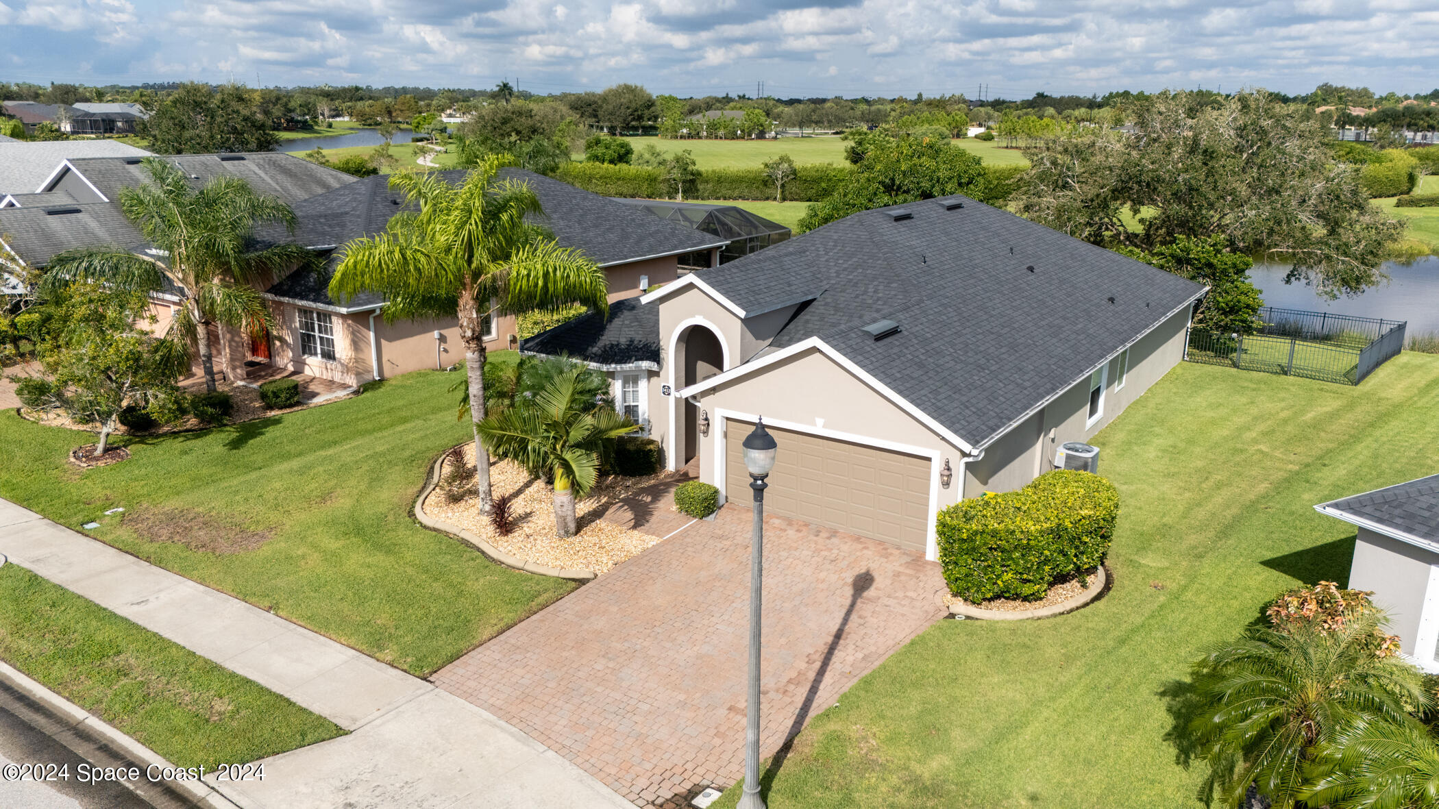 3412 Siderwheel Drive Rockledge, FL 32955 - Photo 8 of 39 an aerial view of a house with a yard