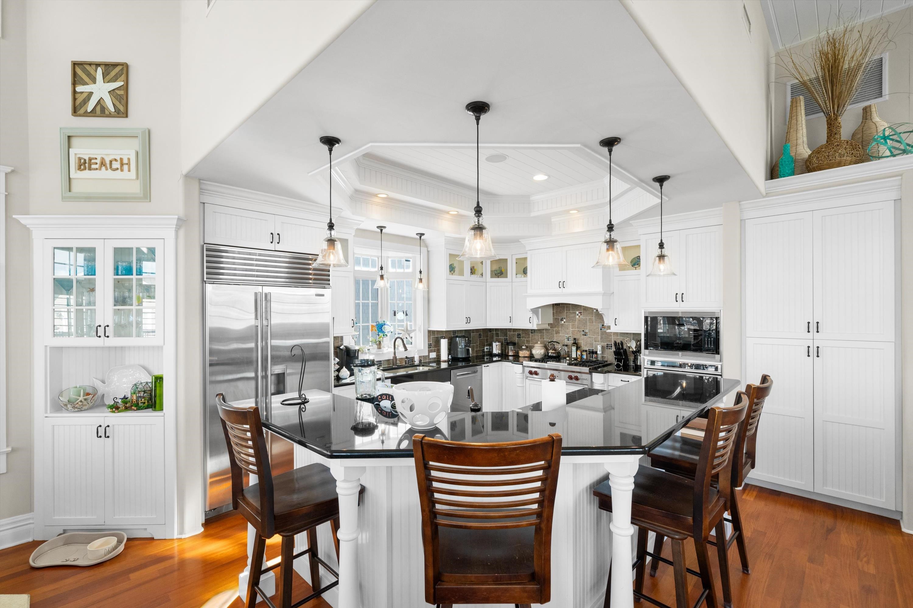 8600 2nd Stone Harbor, NJ 08247 - Photo 12 of 45 a dining room filled with furniture and wooden floor