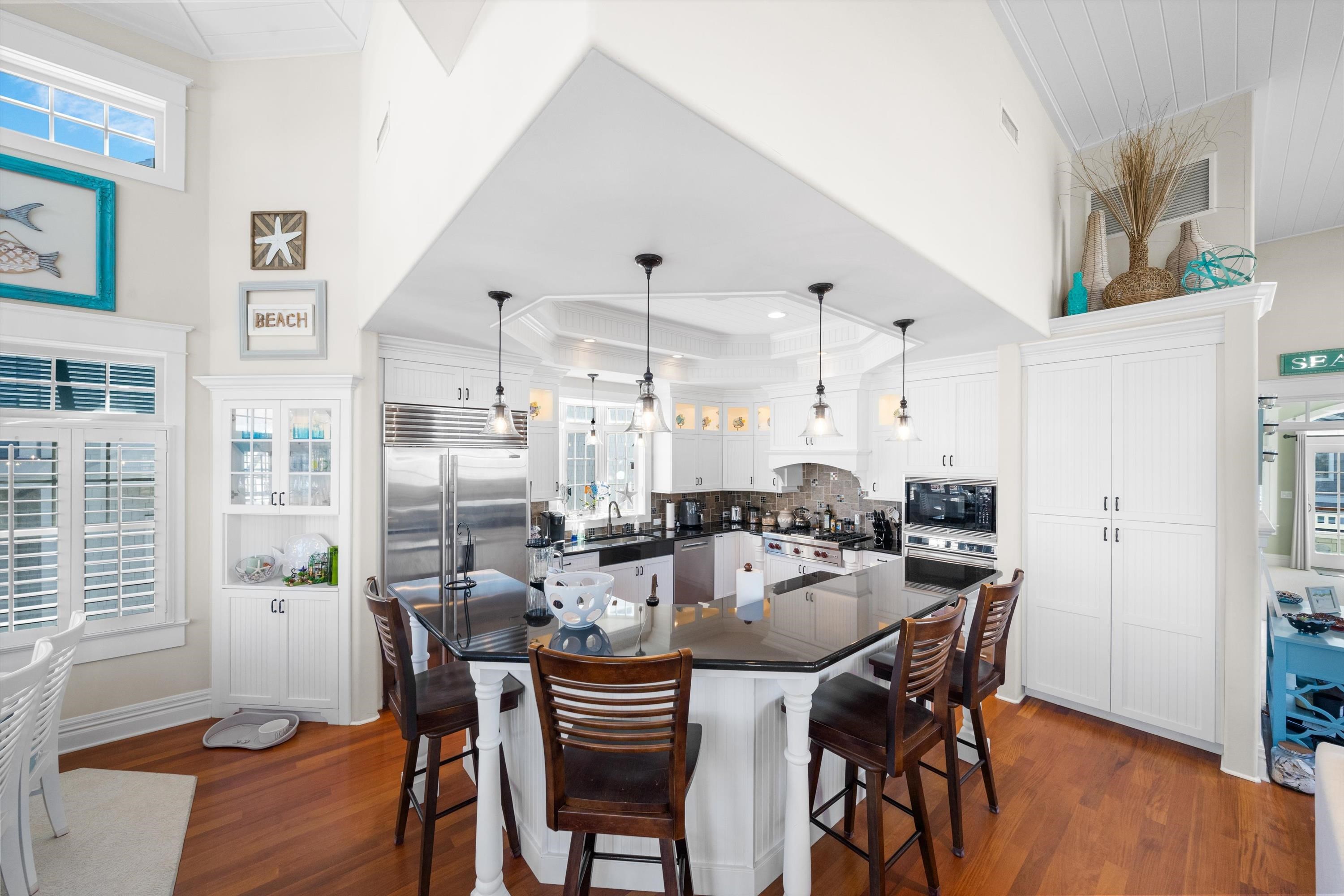 8600 2nd Stone Harbor, NJ 08247 - Photo 15 of 45 a dining room with furniture and wooden floor