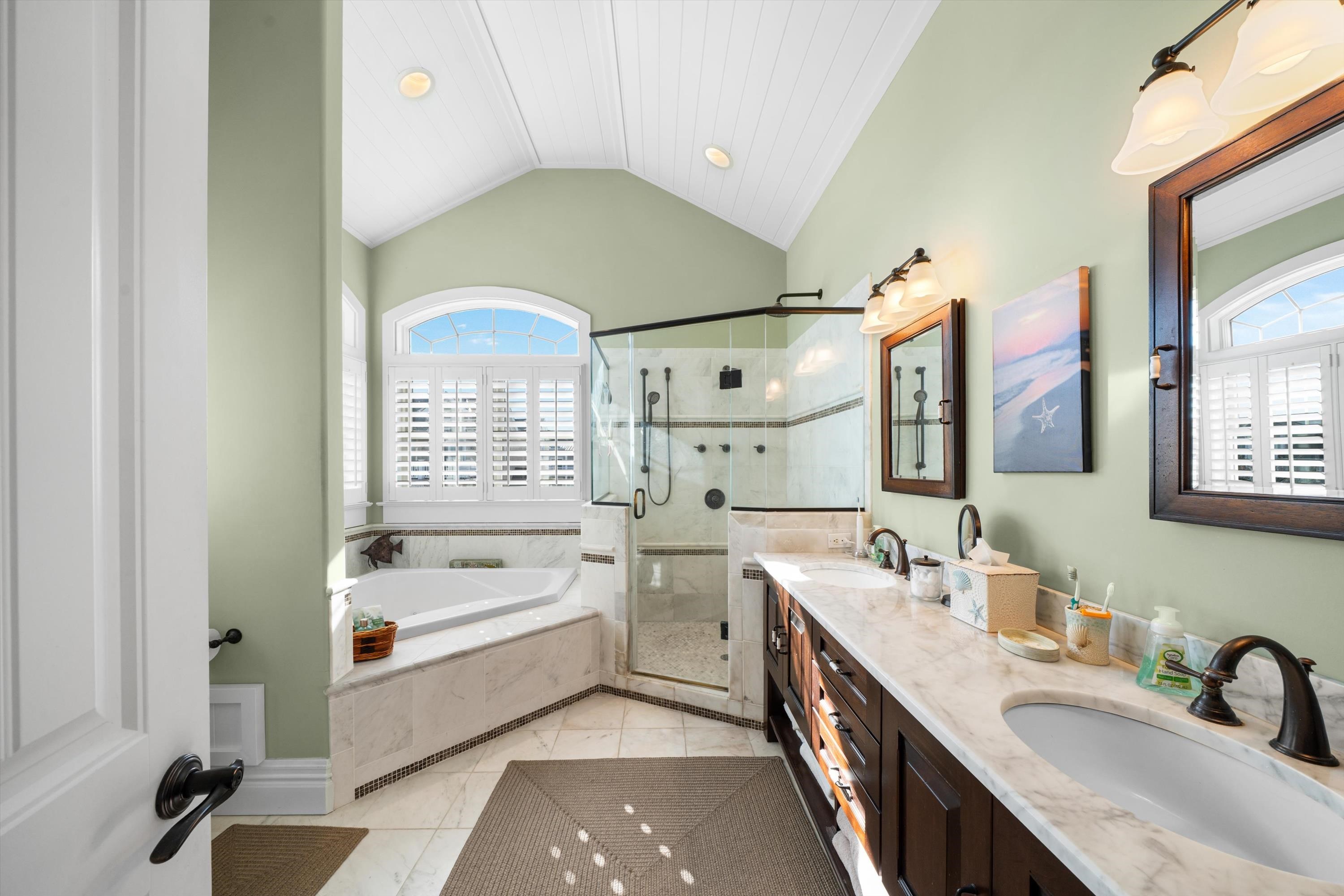 8600 2nd Stone Harbor, NJ 08247 - Photo 20 of 45 a bathroom with a double vanity sink a mirror and a bathtub