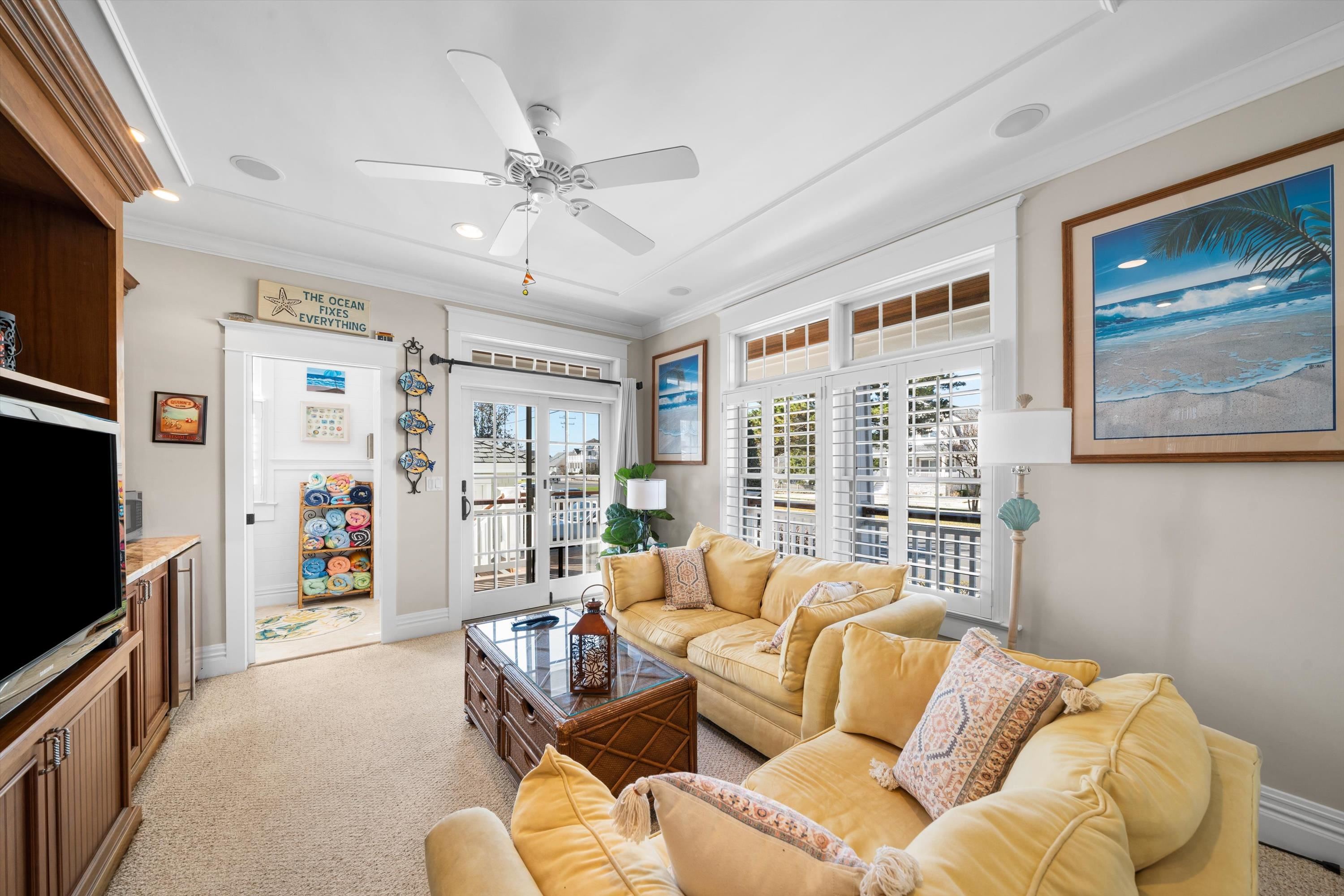 8600 2nd Stone Harbor, NJ 08247 - Photo 2 of 45 a living room with furniture and a flat screen tv