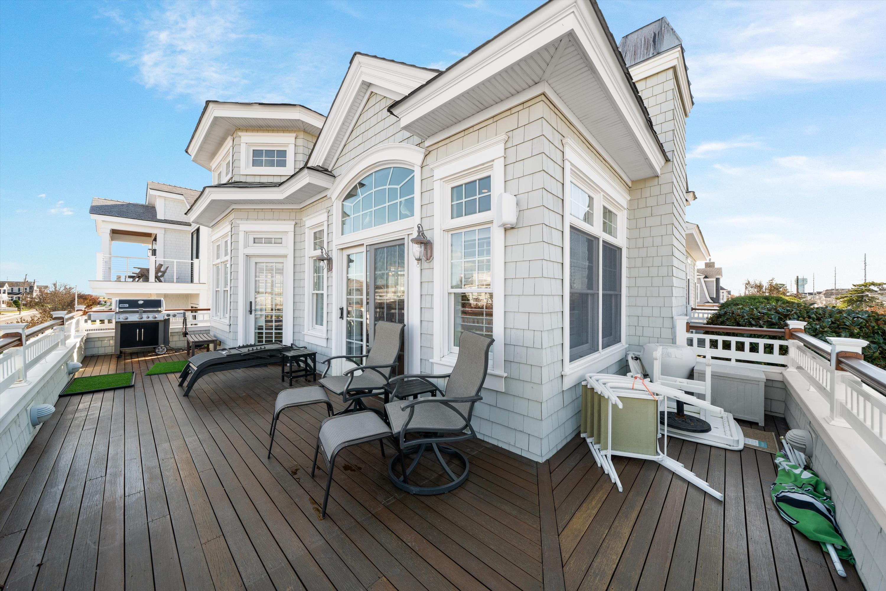 8600 2nd Stone Harbor, NJ 08247 - Photo 23 of 45 a view of a chairs and table on the wooden floor