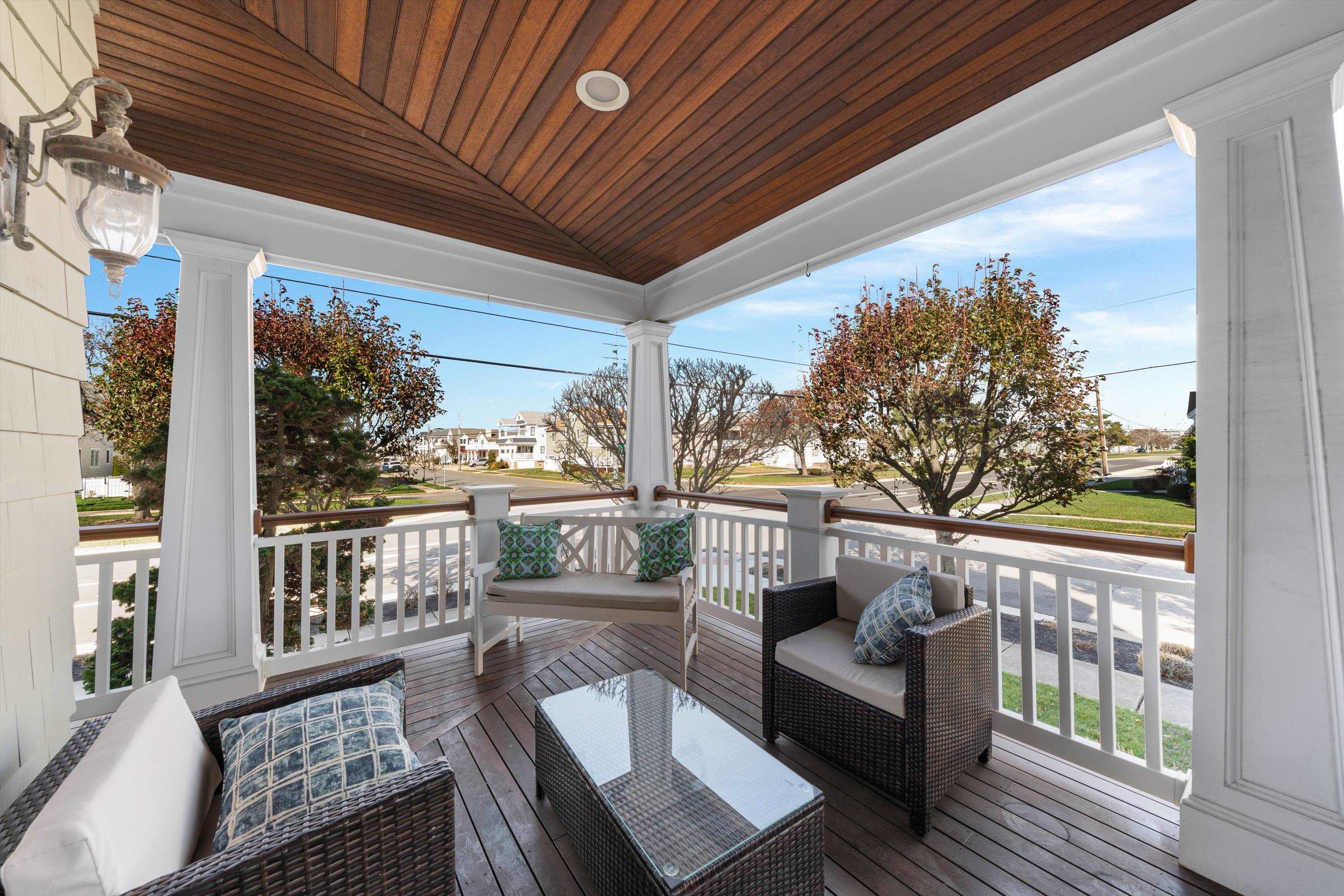 8600 2nd Stone Harbor, NJ 08247 - Photo 29 of 45 a view of balcony with furniture and wooden floor