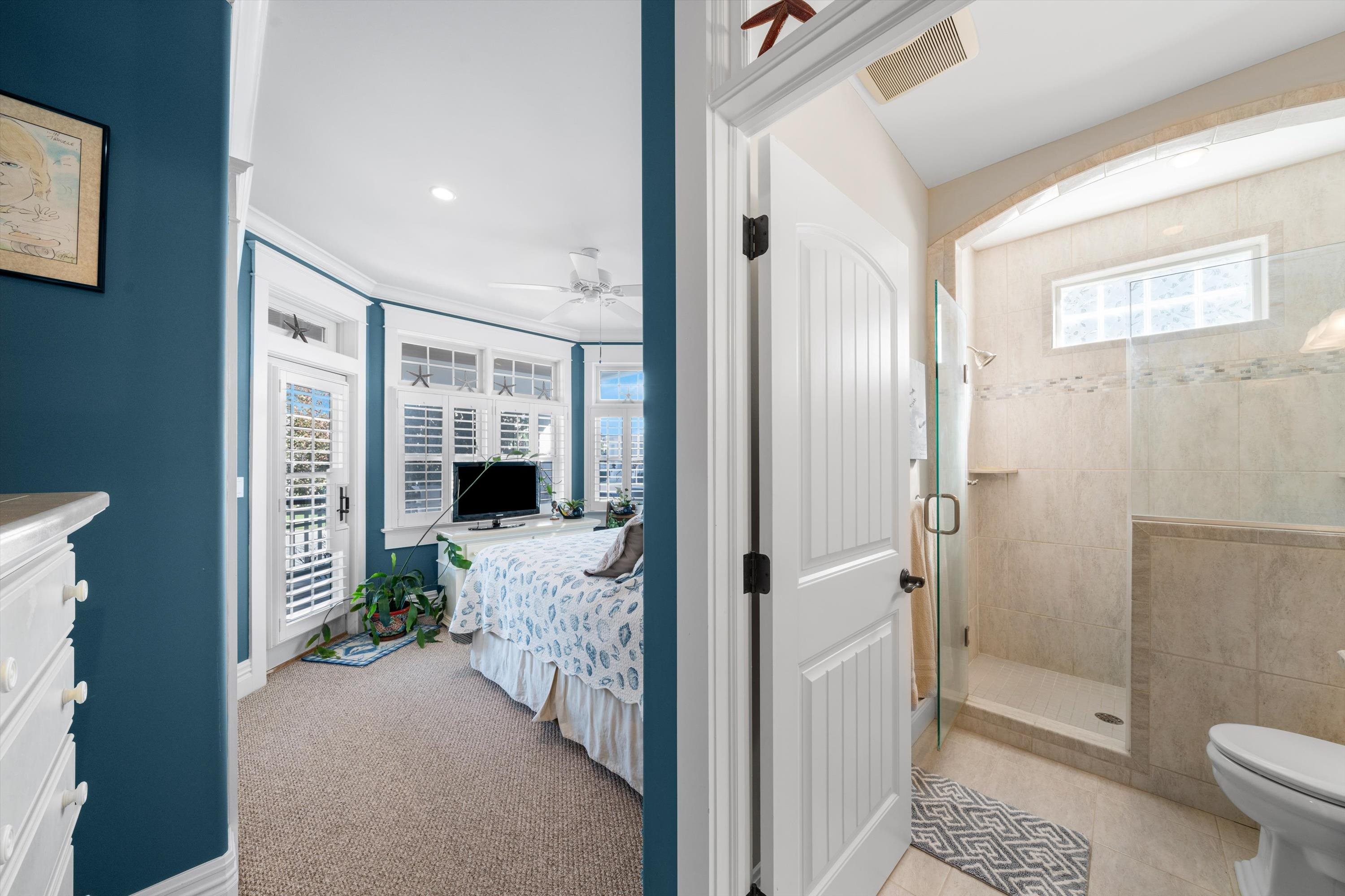 8600 2nd Stone Harbor, NJ 08247 - Photo 31 of 45 a bathroom with a granite countertop sink a toilet and shower