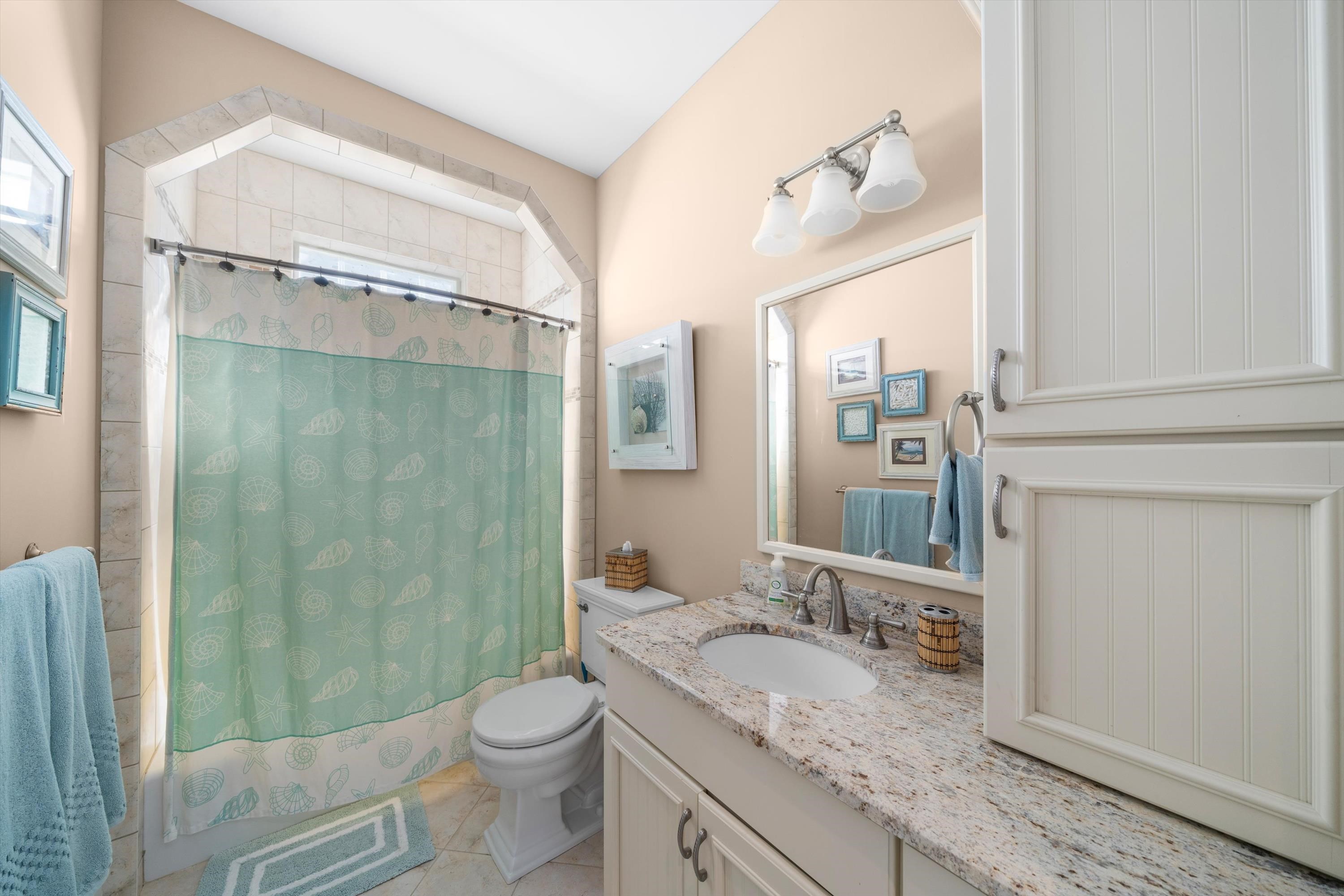 8600 2nd Stone Harbor, NJ 08247 - Photo 38 of 45 a bathroom with a granite countertop sink toilet and shower