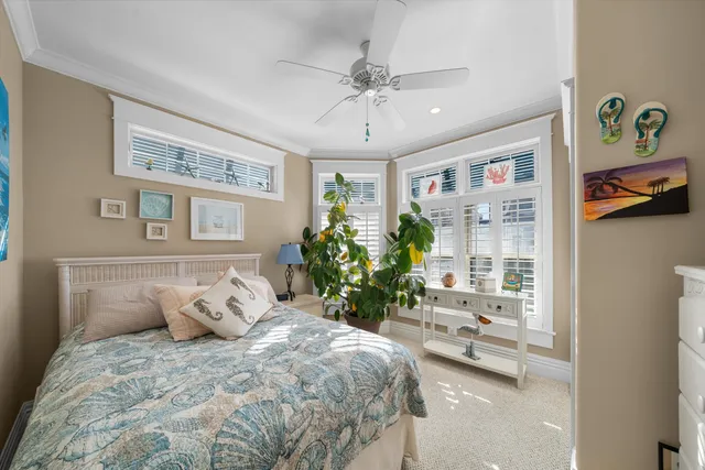 a bedroom with a bed furniture and a window