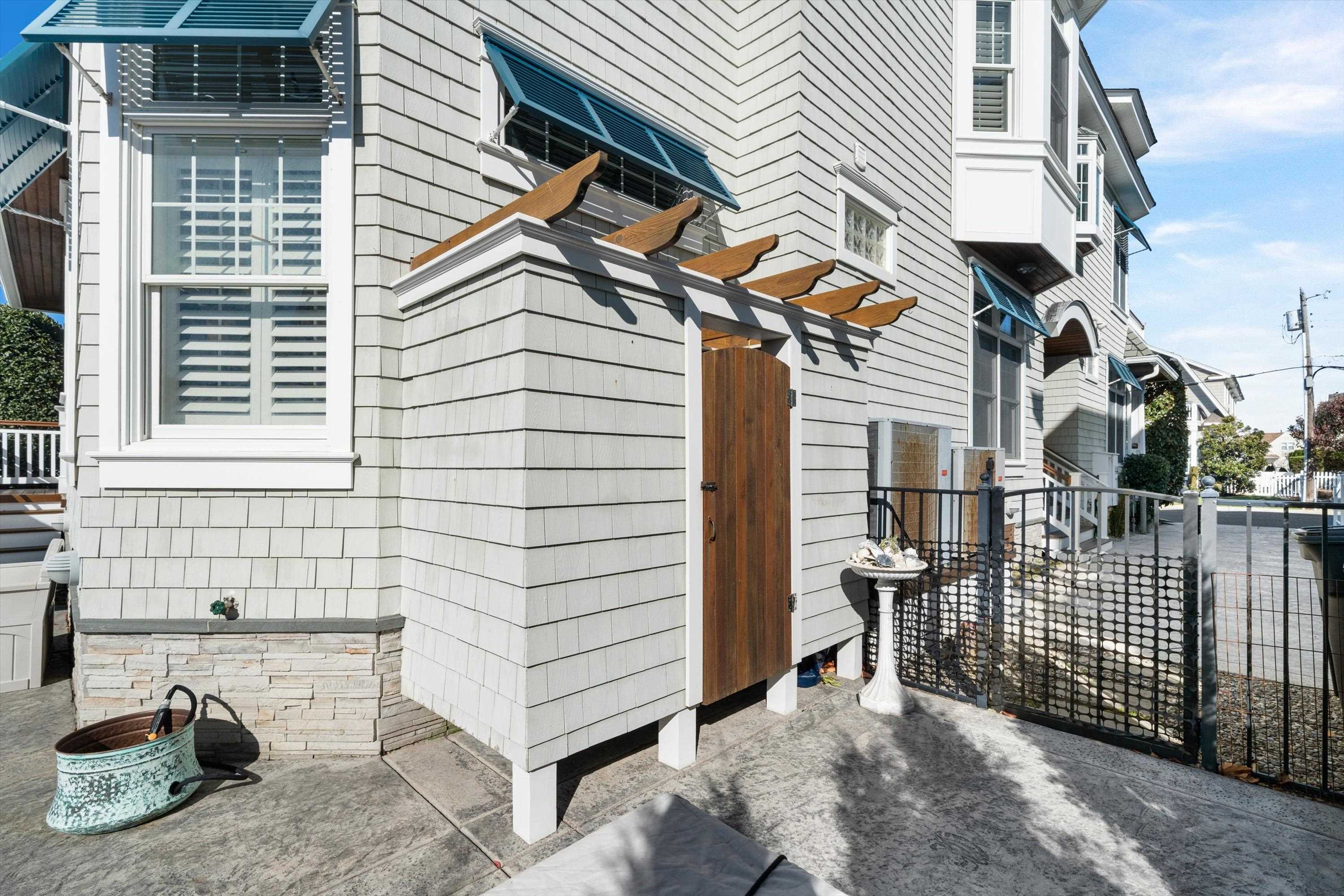 8600 2nd Stone Harbor, NJ 08247 - Photo 42 of 45 a view of a house with a patio and a yard