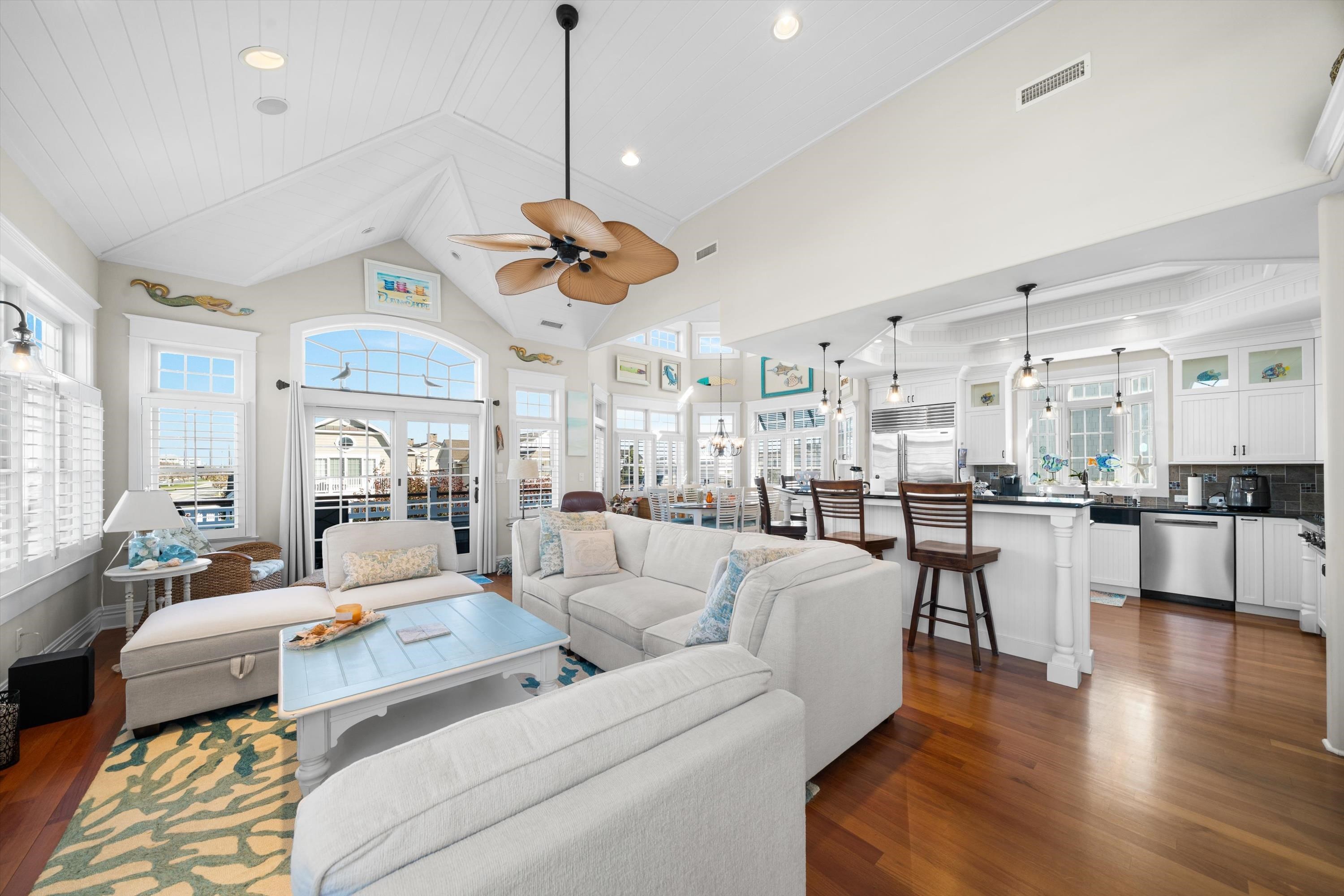 8600 2nd Stone Harbor, NJ 08247 - Photo 7 of 45 a living room with furniture kitchen view and a chandelier