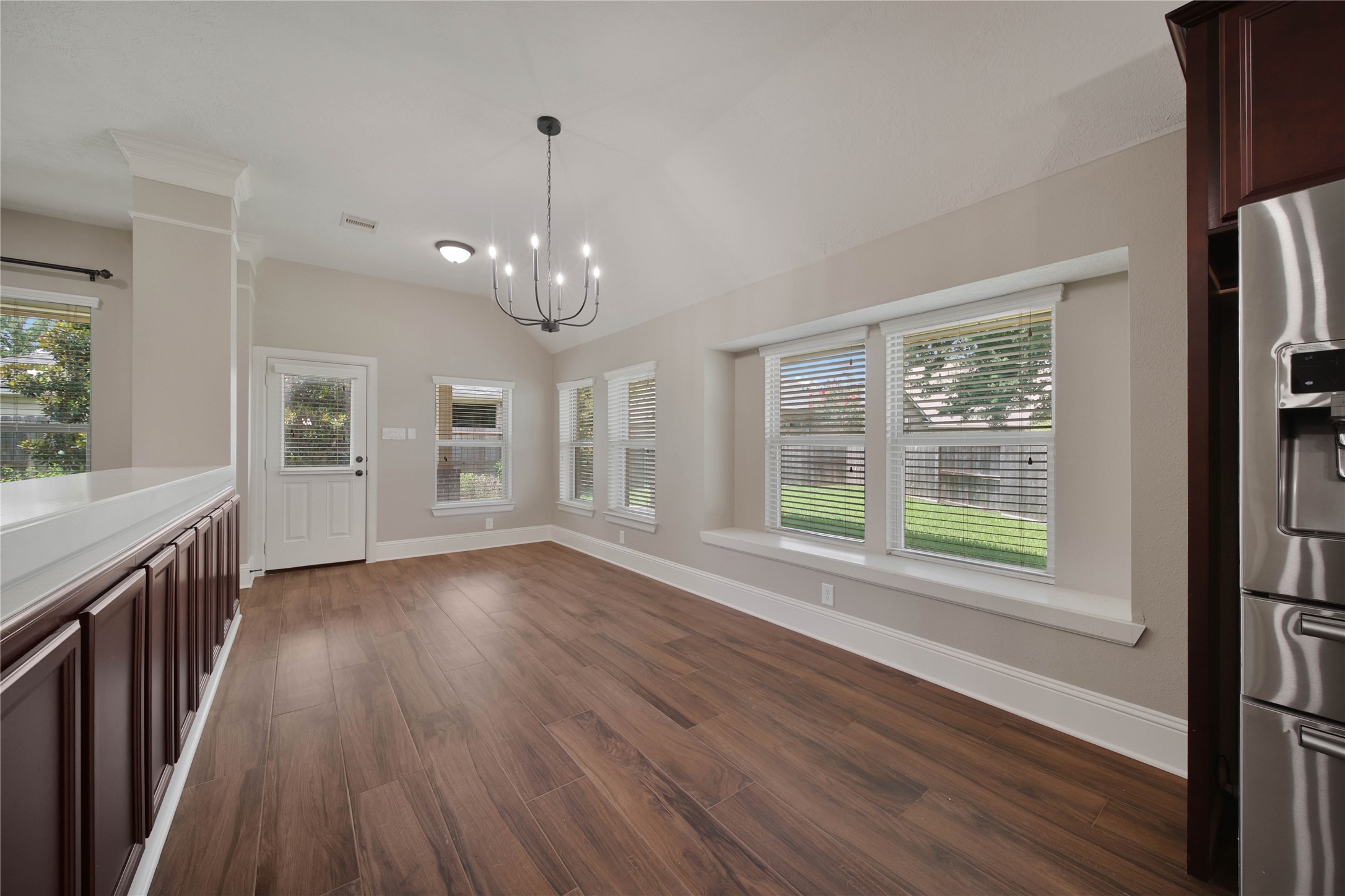 1215 Jake Springs Court Spring, TX 77386 - Photo 10 of 49 The casual dining area is huge! Everyday meals with your family have never been easier than in this large space with plenty of room for friends at your table and bonus storage!