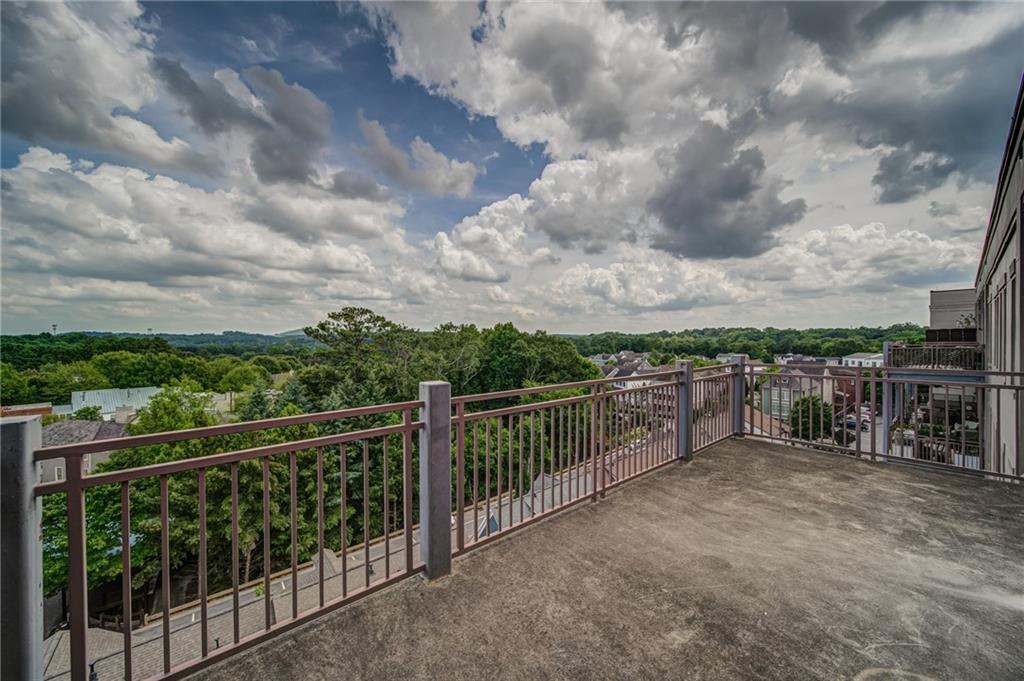 360 Chambers Street Woodstock, GA 30188 - Photo 1 of 1 a view of a balcony with city view