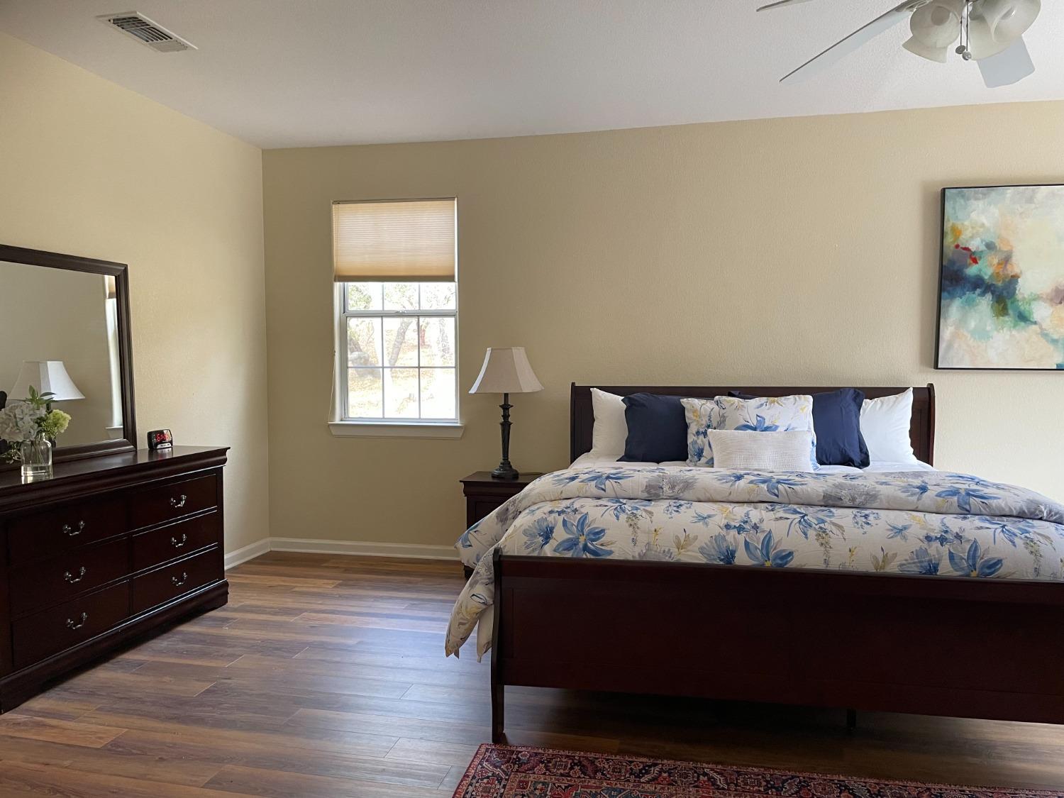 34811 Wintergreen Loop North Fork, CA 93643 - Photo 13 of 18 a bedroom with a bed and window