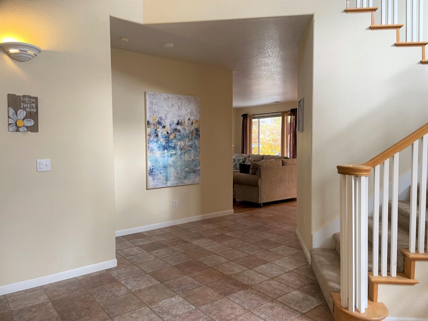 34811 Wintergreen Loop North Fork, CA 93643 - Photo 3 of 18 a view of livingroom with furniture and staircase