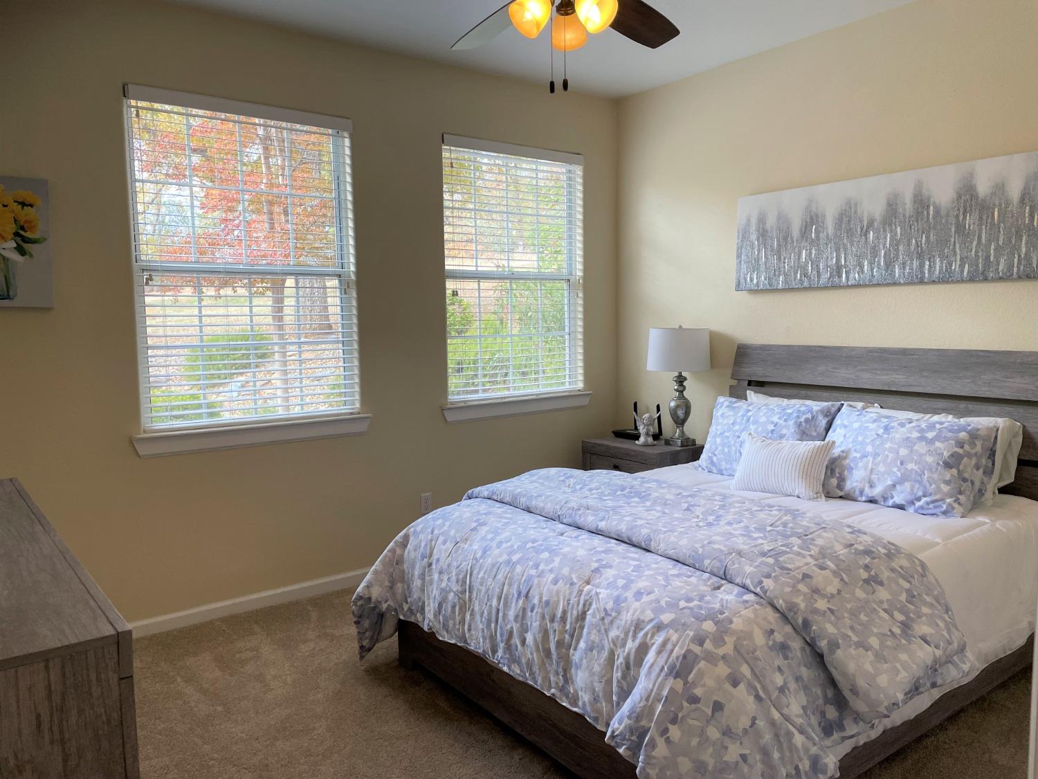 34811 Wintergreen Loop North Fork, CA 93643 - Photo 10 of 18 a bed sitting in a bedroom next to a window