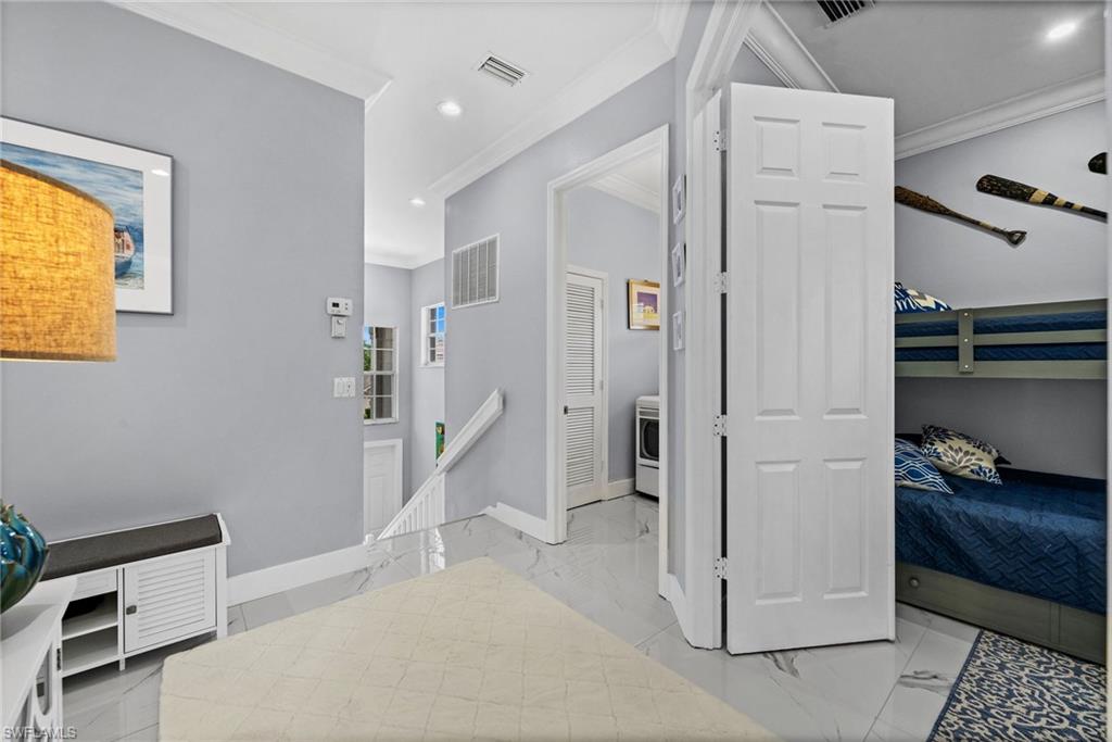 5010 Marina Cove Drive, Unit 4 Naples, FL 34112 - Photo 23 of 42 a view of a hallway with workspace and entryway