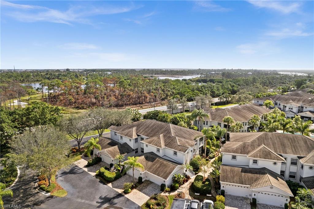 5010 Marina Cove Drive, Unit 4 Naples, FL 34112 - Photo 33 of 42 an aerial view of residential houses with outdoor space