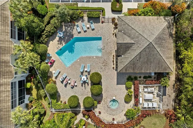 an aerial view of a house with garden