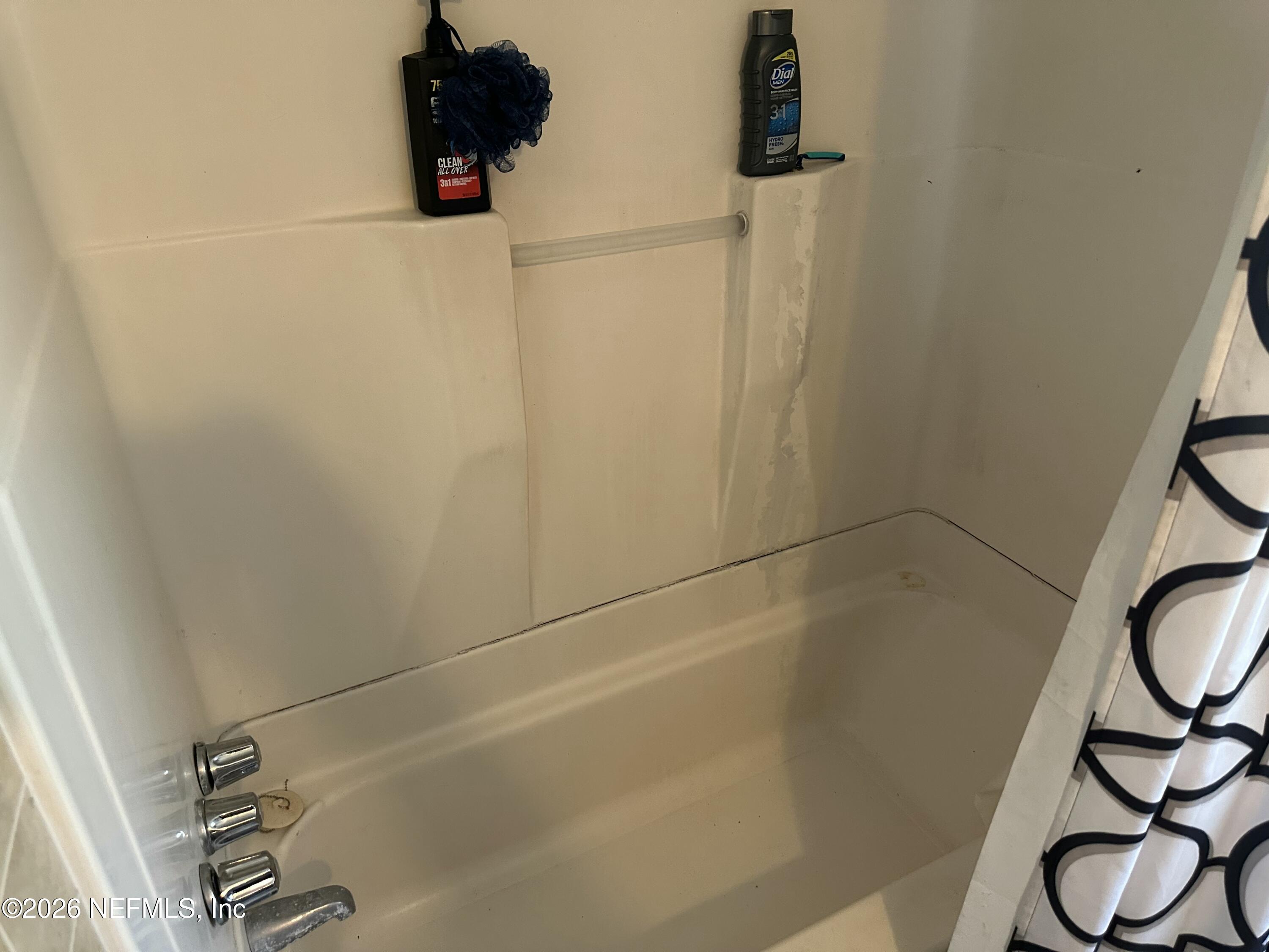 2351 Gaillardia Road Jacksonville, FL 32211 - Photo 11 of 19 a bathroom with a shower