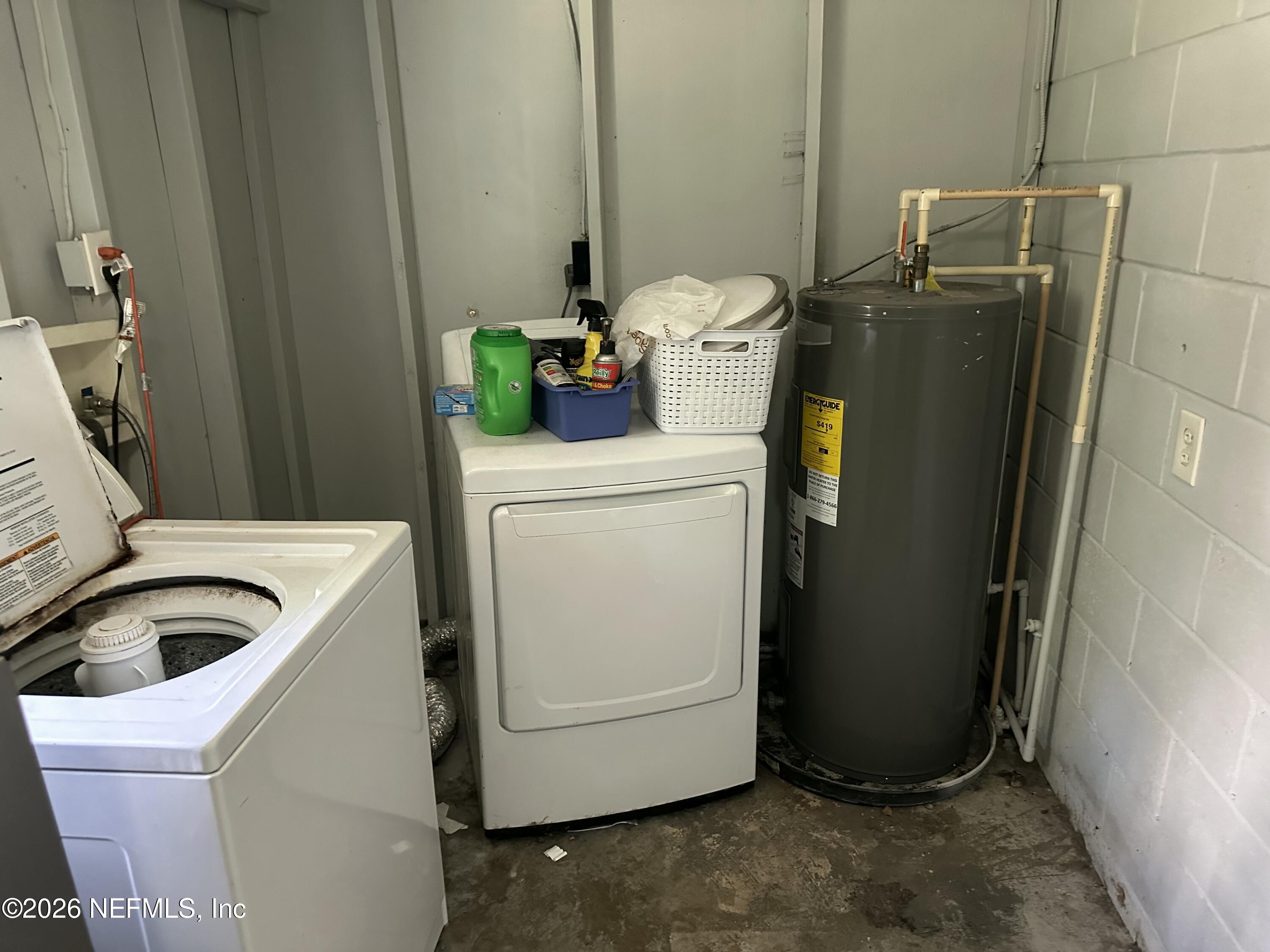2351 Gaillardia Road Jacksonville, FL 32211 - Photo 17 of 19 a utility room with dryer and washer