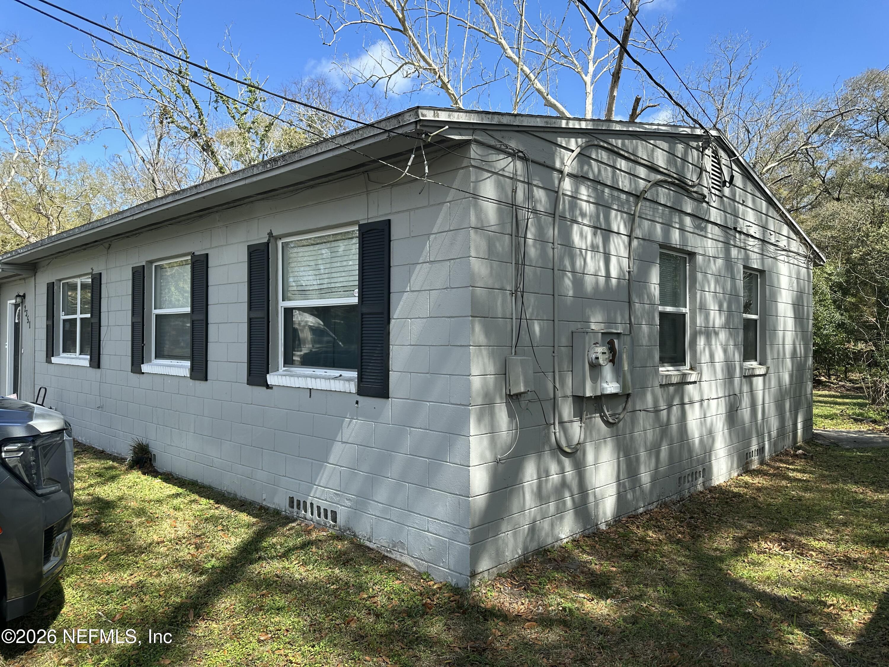 2351 Gaillardia Road Jacksonville, FL 32211 - Photo 3 of 19 a backyard of a house