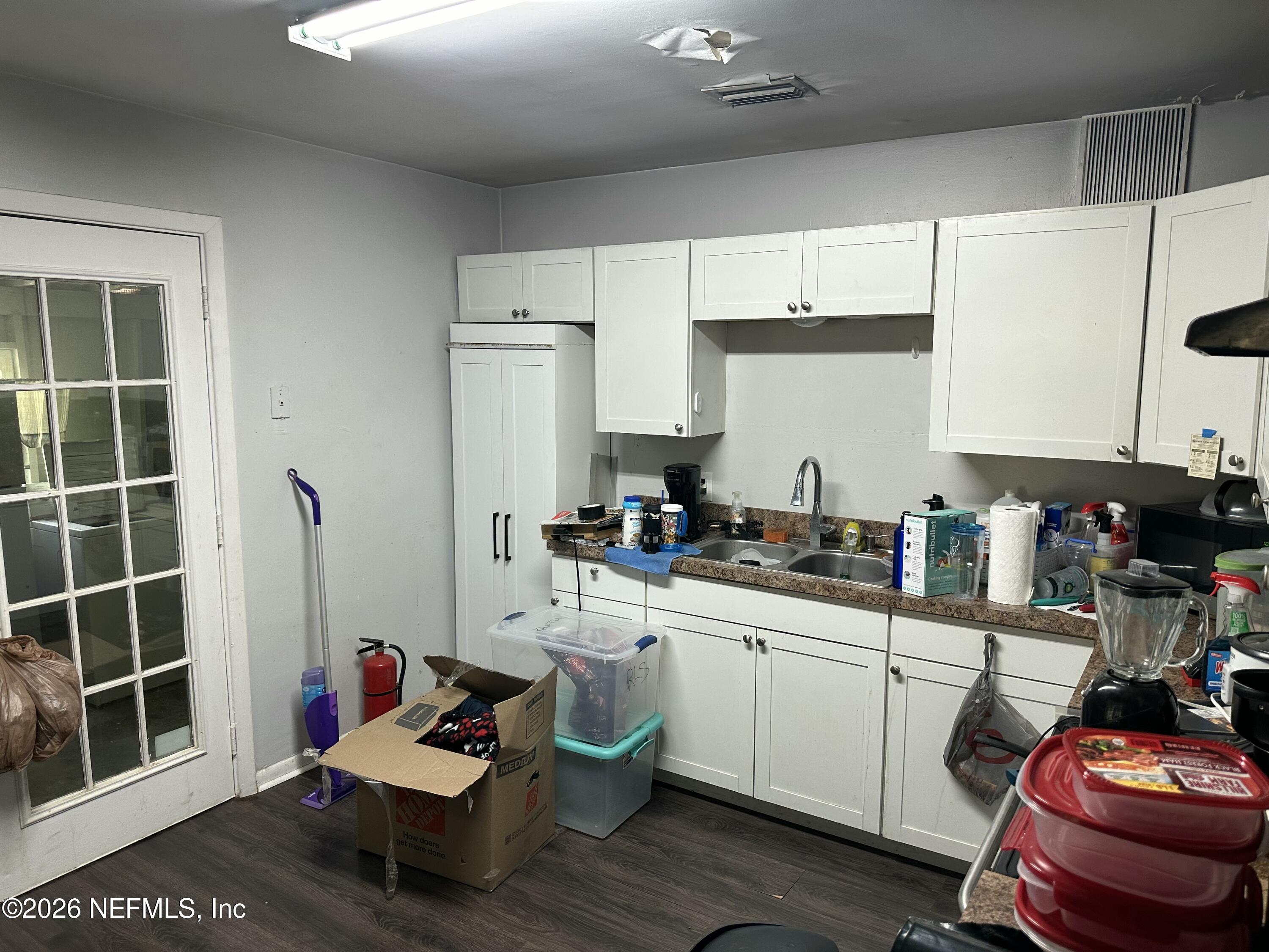 2351 Gaillardia Road Jacksonville, FL 32211 - Photo 4 of 19 a kitchen with a sink appliances and cabinets