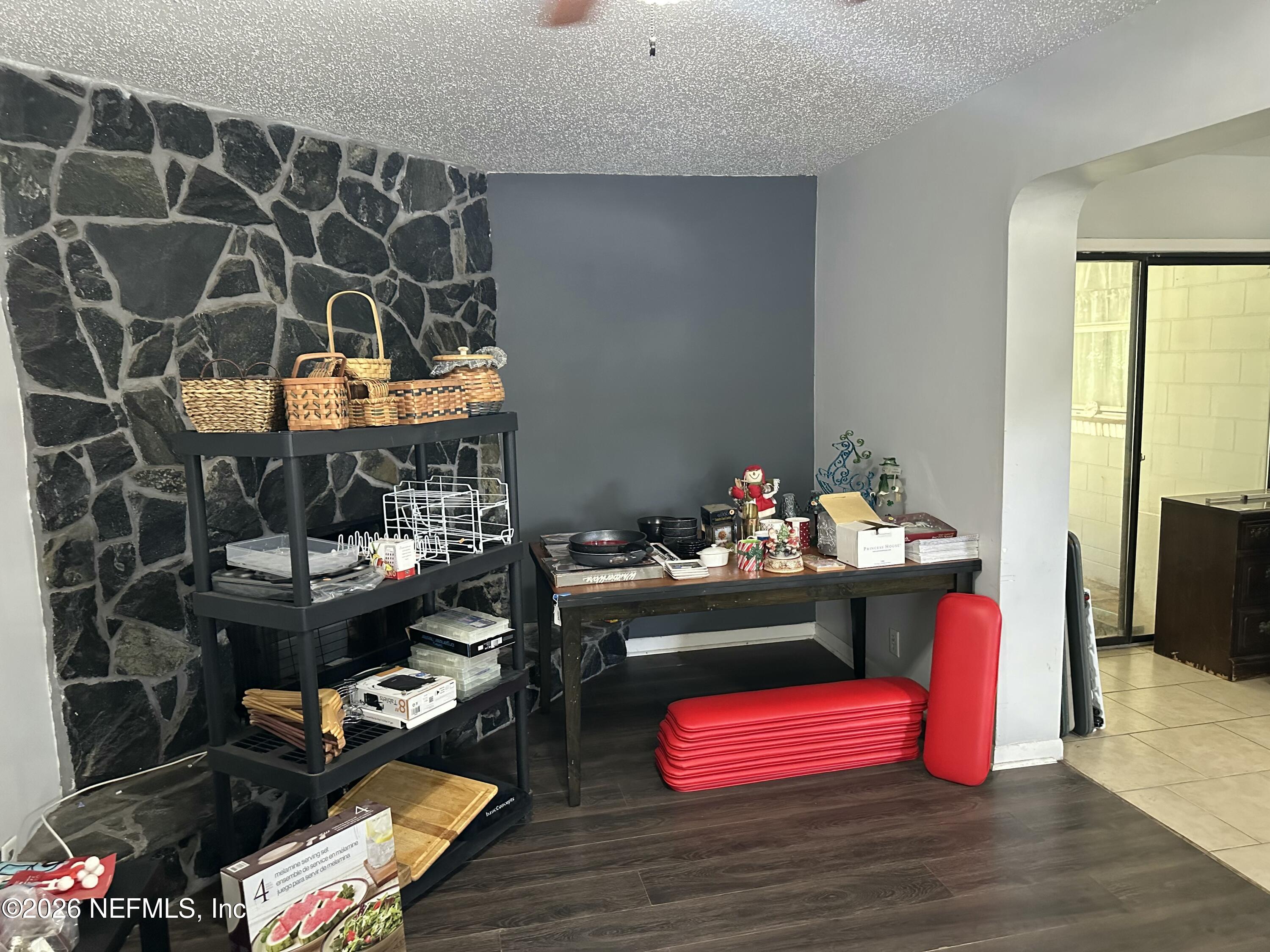 2351 Gaillardia Road Jacksonville, FL 32211 - Photo 5 of 19 a room with musical instruments