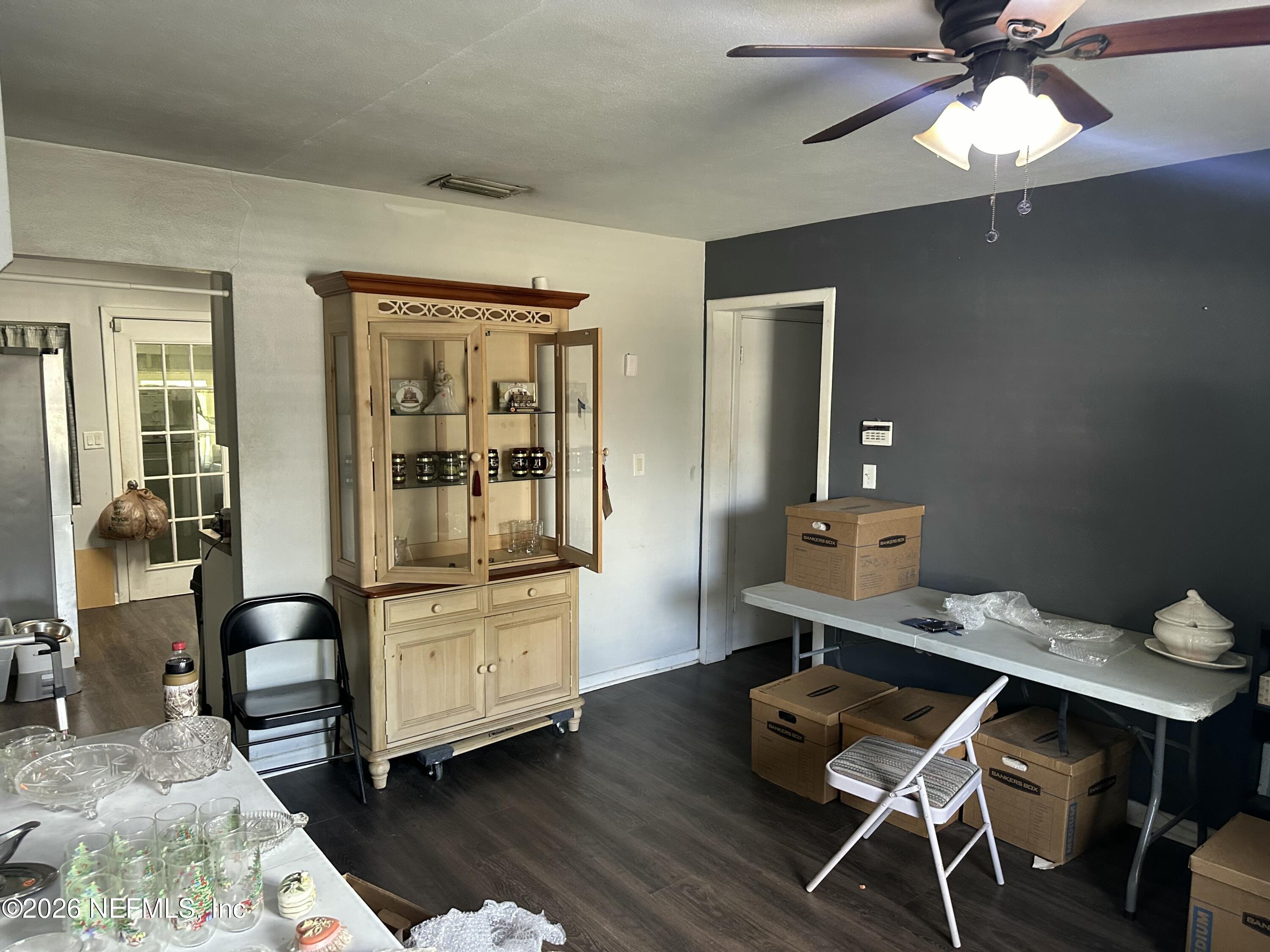 2351 Gaillardia Road Jacksonville, FL 32211 - Photo 8 of 19 a room with furniture and wooden floor