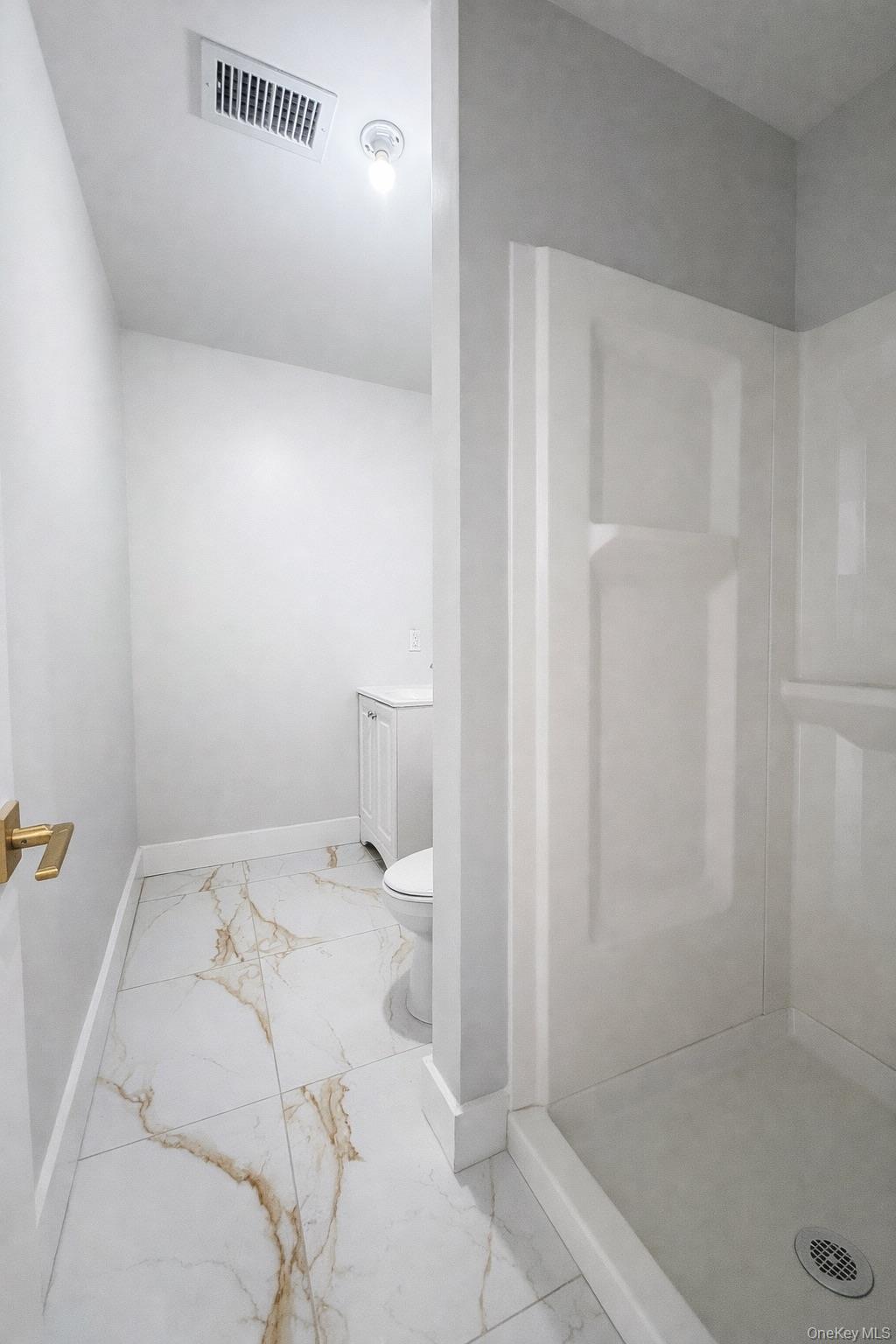 1140 Highway 52, Unit 5 Loch Sheldrake, NY 12759 - Photo 14 of 22 a bathroom with a bathtub and shower