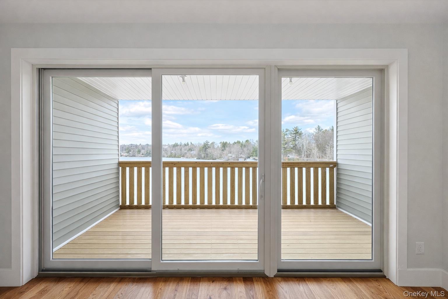 1140 Highway 52, Unit 5 Loch Sheldrake, NY 12759 - Photo 16 of 22 a view of wooden floor and a window