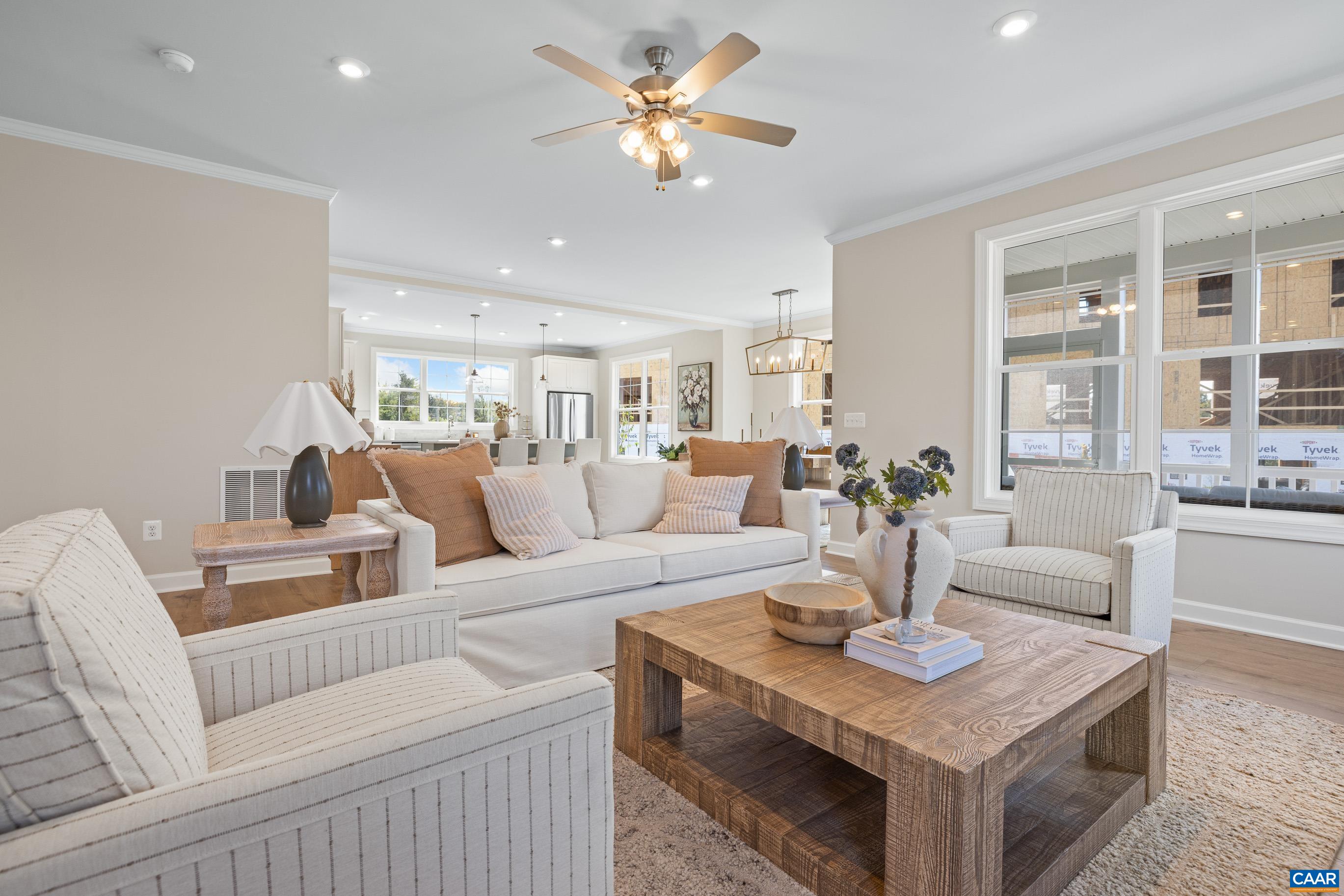 2 D Corsham Street Crozet, VA 22932 - Photo 11 of 44 a living room with furniture a table and a chandelier