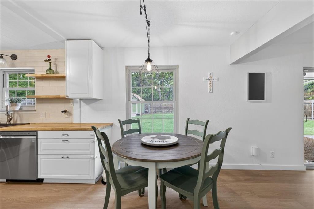 405 Pecan Street Azle, TX 76020 - Photo 12 of 33 Dining area with light wood-style floors