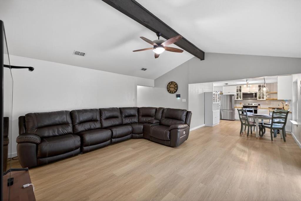 405 Pecan Street Azle, TX 76020 - Photo 10 of 33 Living room with light wood-style floors and ceiling fan