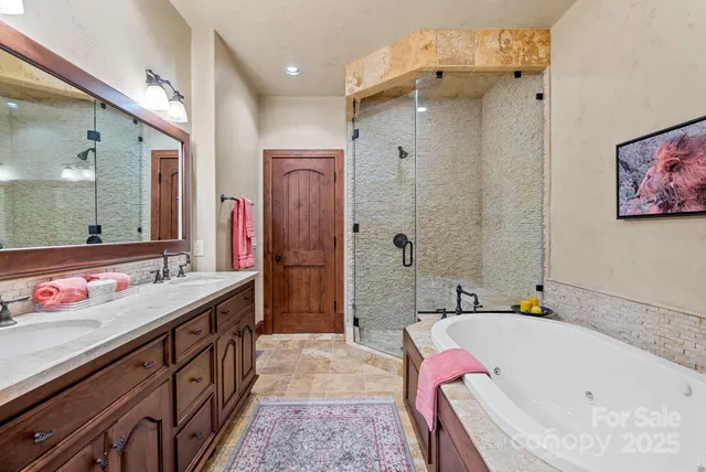 a living room with furniture and a painting on the wall