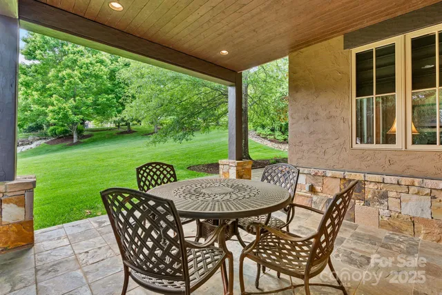 a view of a lake with a large trees