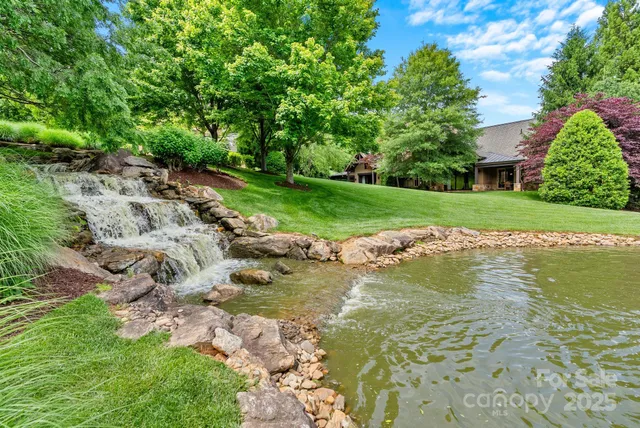 a view of a house with backyard porch and sitting area