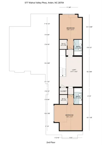 a front view of a house with a yard table and chairs